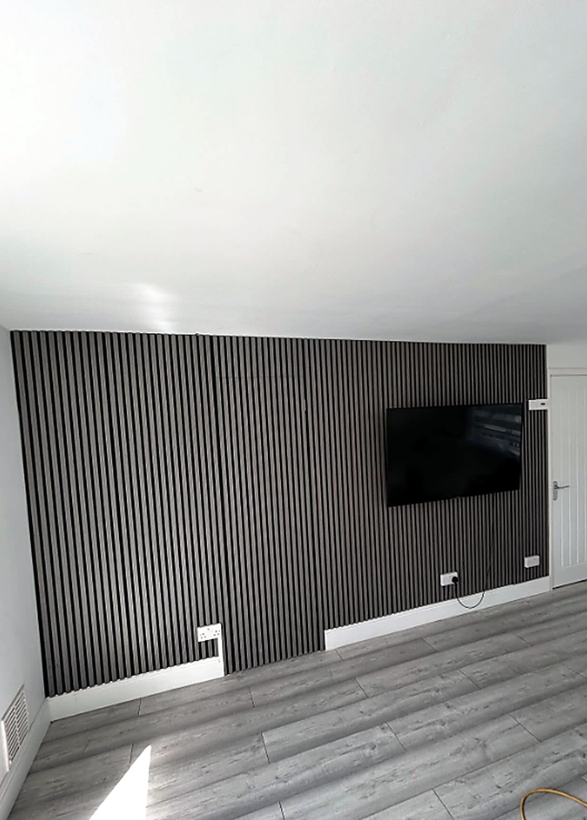 Hardwood slat feature wall installed by CV Carpentry & Construction