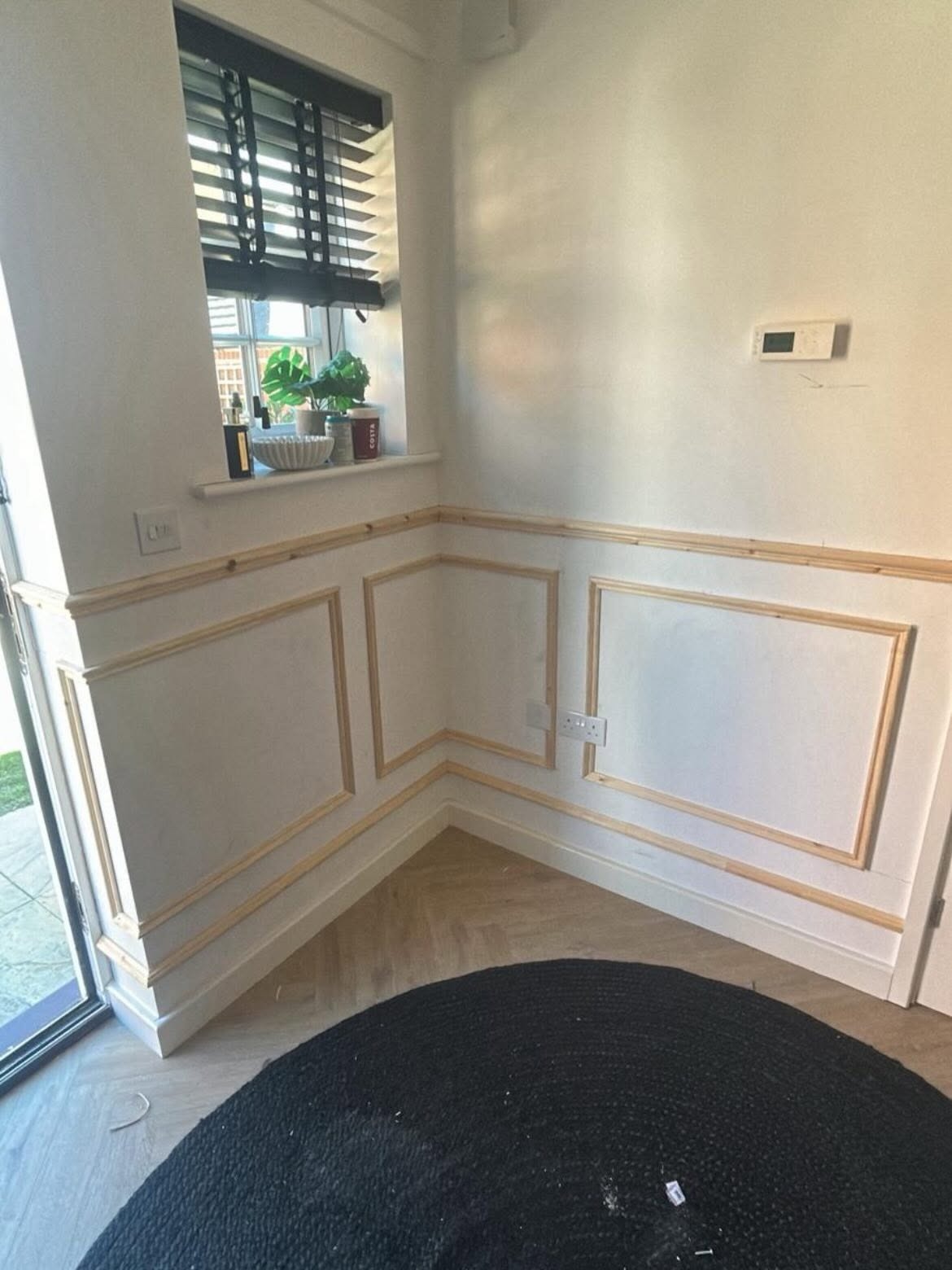 Wall panelling set out before installation, second fix carpentry planning in Cambridge