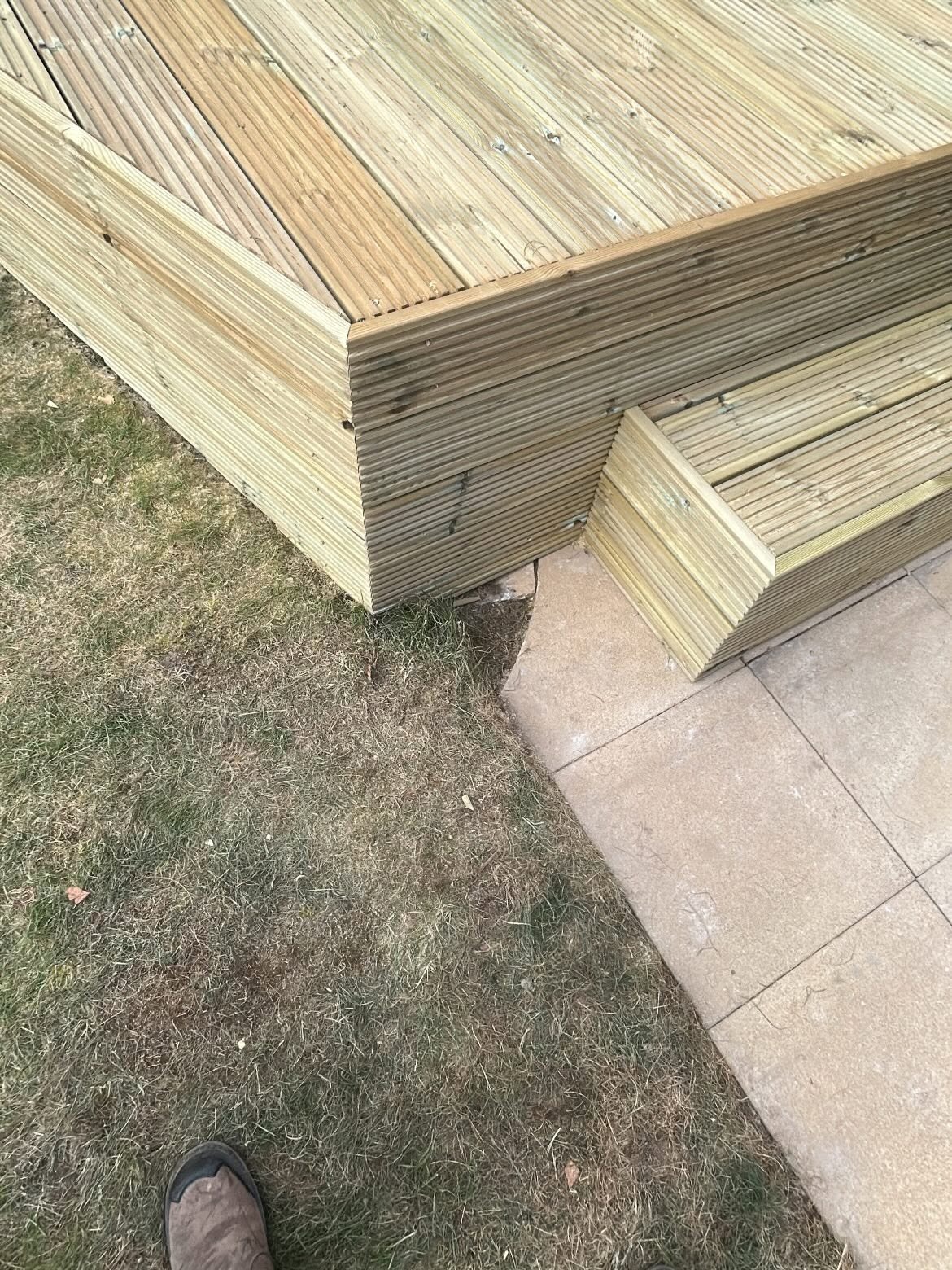Decking corner and step detail: timber decking built by CV Carpentry & Construction