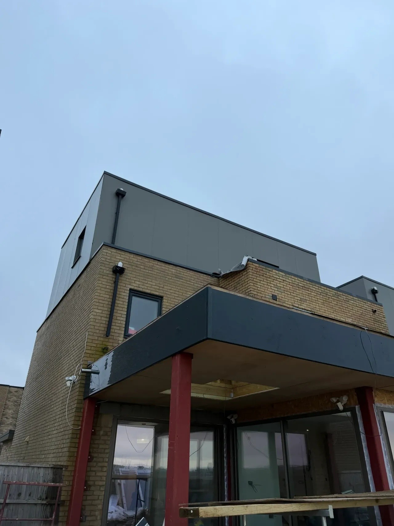 Grey clad two-storey extension exterior built by CV Carpentry & Construction